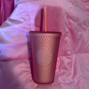 Grande studded Starbucks cup.